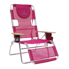 a pink folding lawn chair with a cup holder on the armrest and foot rest