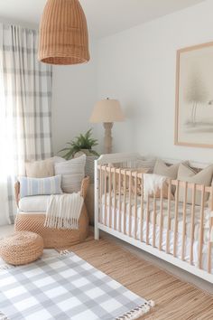 a baby's room is decorated in neutral colors