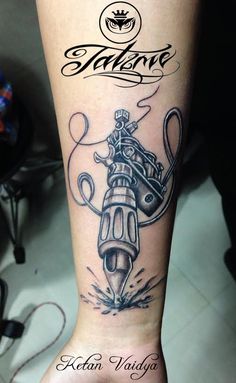 a tattoo on the leg of a woman with an image of a motorbike