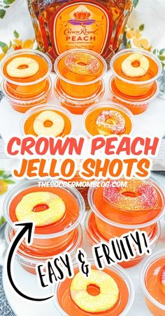 there are many orange jello shots on the table