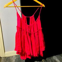 Size Large Never Worn. Summer Rayon Blouse, Flowy Sleeveless Rayon Top, Sleeveless Rayon Top With Ruffles, Sleeveless Ruffled Rayon Tops, Summer Rayon Blouse For Brunch, Summer Pink Rayon Blouse, Sleeveless Rayon Blouse For Vacation, Festival Crop Tops, Red Tunic