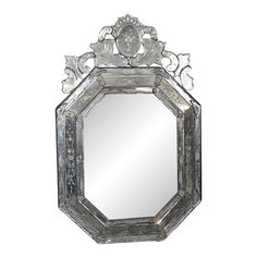 an ornate mirror is shown against a white background