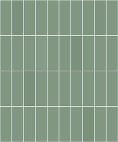 a green tiled wall with white lines on it's sides and the bottom half