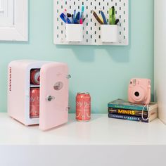 This pretty pink portable cooler with retro refrigerator design and chrome accents holds up to six standard soda cans and adds vintage charm to any home or dorm. Efficient thermoelectric cooling technology and AC and DC adapters mean you can keep your favorite drinks cold or safely store items such as yogurt, cheese, milk, cosmetics, and infant formula whether you're at home or on the go. Koolatron 4L Retro Portable 6 can personal cooler 0.14-cu ft Mini Fridge (Pink) | KRT04-P Table Top Fridge, Yogurt Cheese, Portable Mini Fridge, Retro Refrigerator, Fridge Cooler, Mini Cooler, Beer Fridge, Infant Formula, Portable Fridge