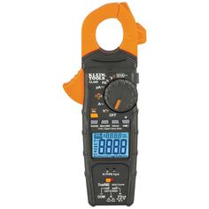 an orange and black digital clamper with thermometer on it's side