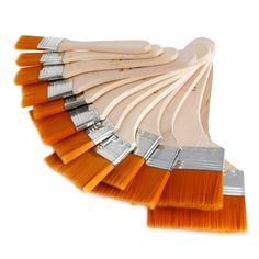 an assortment of orange and white paint brushes