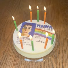 a birthday cake that has been decorated with candles