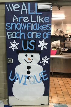 a door decorated with a snowman saying we all are like snowflakes each one of us