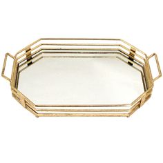 an octagonal gold tray with handles