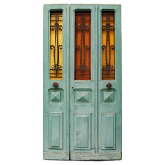 This antique French Art Deco oak pine door was reclaimed from a property in Le Mans, France. Currently finished with desirable distressed paint in a soft duck egg green to one side, this would certainly make a beautiful exterior door for an entrance way to a traditionally styled property. The textured stained glass windows can be opened from the inside with scrolling cast iron grills to the front. Main door width 75.5cm (29.72 in) Art Nouveau Door Design, Art Nouveau Stained Glass Door, Pine Doors, Cast Iron Grill, Entrance Ways, Main Door, Door Gate, Oak Doors, Garden Elements