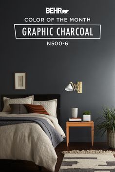 a bedroom with gray walls and brown accents