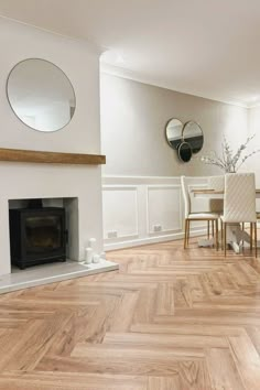 Light wood effect herringbone flooring in a spacious living room with a neutral pallete Wooden Floors Living Room, Neutral Living Room Ideas, Direct Wood Flooring, Light Wooden Floor, Room Ideas Living Room, Herringbone Wood Floor, Oak Laminate Flooring, Oak Laminate, Neutral Living Room