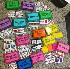 some sort of matching cards and magnets on a table