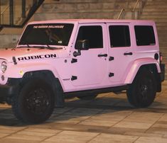 a pink jeep is parked in front of some stairs and steps with the word puelion written on it