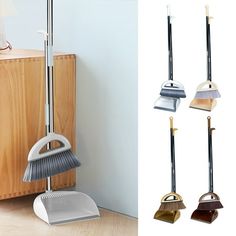 three brooms, one with a dustpan and the other with a mop