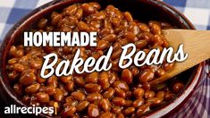 homemade baked beans in a bowl with a wooden spoon on the side and text overlay reading homemade baked beans