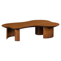 an oval wooden table with two curved legs