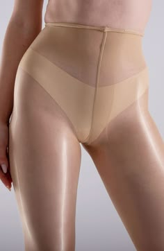 A perfect option to accentuate your legs, these sheer tights flatter with a supersilky illuminating effect. 20-denier yarn Polyamide/elastane/cotton Hand wash, dry flat Imported Fitted Smoothing Beige Hosiery, Beige Smoothing Stretch Tights, Elegant Compressive Tights, Elegant Compressive Thigh High Legwear, Elegant Beige Micro-elastic Hosiery, Thigh High Shapewear Legwear, Elegant Compressive Thigh-high Legwear, Elegant Thigh-high Compressive Legwear, Elegant Thigh-high Compressive Bottoms