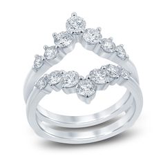 two pieces of white gold with diamonds on each side and an open ring in the middle