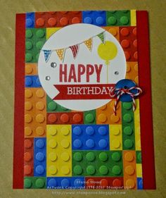 a happy birthday card made out of legos