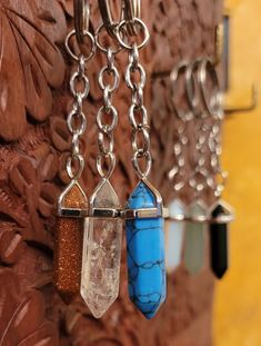 Introducing our enchanting crystal point keychains, designed to infuse your everyday essentials with the captivating energy of natural gemstones. Each keychain features a mesmerizing crystal point meticulously crafted from a variety of stones, including howlite, clear quartz, blue goldstone, jasper, and many more, ensuring that there's a perfect match for every style and intention. Let's explore the magic of each stone: Howlite: Known for its calming properties, howlite promotes tranquility and Gemstone Keychain, Spiritual Adjustable Hand-strung Crystal Necklaces, Spiritual Adjustable Nickel-free Crystal Necklace, Mystical Nickel-free Crystal Necklaces For Gifts, Amethyst Keychain, Gold Tiger Eye, Blue Goldstone, Snowflake Obsidian, Crystal Points