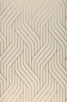 an abstract white and gold wallpaper with wavy lines in the center, as if it were made out of paper