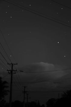 the night sky is full of stars and power lines