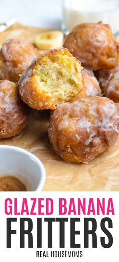 glazed banana fritters on a cutting board with dipping sauce