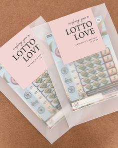 three packets of lotto love sitting on top of a table next to each other