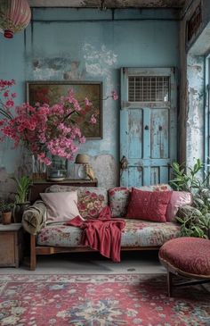 a living room filled with furniture and flowers