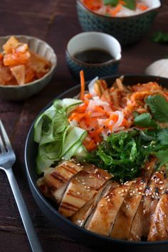 a close up of a plate of food with meat and veggies on it