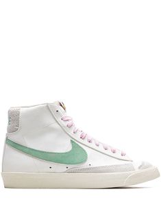 white light grey pink light green signature Swoosh logo detail round toe front lace-up fastening logo patch at the tongue ankle-length branded insole flat rubber sole These styles are supplied by a premium sneaker marketplace. Stocking only the most sought-after footwear, they source and curate some of the most hard to find sneakers from around the world. Pink Nike High Tops, Mid Blazer 77, Nike Mid Blazer, High Tops Nike, Ella Shoes, Blazer 77, Nike Blazers, Nike High Tops, Preppy Shoes