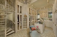 a room with many closets and stairs in it