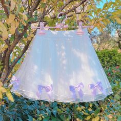 You'll feel like a ballerina in this Tulle Pleated Bow Mini Skirt! Size Chart: Size Waist (cm) Hips (cm) Length (cm) Waist (in) Hips (in) Length (in) One Size 60-75 98 36 23.62-29.53 38.58 14.17 Description: Silhouette: A-LineMaterial: Polyester/Mesh/VoileDecoration: BowOrigin: CN(Origin)Waistline: EmpirePattern Type: BowsSkirt Length: Above Knee, MiniFabric Type: Mesh Kawaii Skirt, Tulle Material, Skater Aesthetic, Japanese Harajuku, Tulle Bows, White Tulle, Swimwear Dress, Puff Sleeve Dresses, Girls Wardrobe