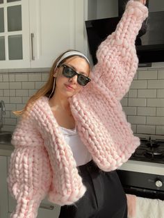 Hello, if you would like to knit this wonderful cardigan yourself, you can find the pattern on my page, I will be happy to help you. Now is the perfect time to elevate your style and wrap yourself in warmth! The Chunky Cardigan is a hand-knitted wonder that will keep you cozy on chilly days while adding a touch of elegance to your look. Features: 🌟 Stylish and Warm: This knitted jacket is crafted with thick wool that's both stylish and heat-retaining. It will keep you warm during cold days and elevate your fashion game year-round. 🧶 Handcrafted Elegance: Meticulously and attentively hand-knitted, this cardigan showcases the pinnacle of quality craftsmanship. Every detail is crafted with special care. 🌈 Color Options: The product is sent in the same colors as seen in the images, ensuring Hand Knit Cardigan Patterns, Trendy Handmade Knit Sweater, Trendy Handmade Knit Cardigan, Trendy Handmade Cardigan For Winter, Handmade Trendy Cardigan For Winter, Cozy Handmade Pink Cardigan, Handmade Trendy Winter Cardigan, Trendy Knitted Winter Cardigan, Trendy Winter Knitted Cardigan