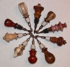 a group of different types of wine stoppers arranged in a circle