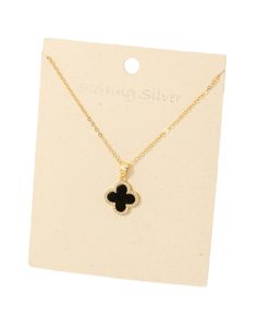 Experience the elegant and timeless beauty of our BLACK & GOLD CLOVER PENDANT. Handcrafted with 100% sterling silver, this pendant exudes sophistication and luxury. Adorn your neckline with this stunning piece and elevate your style to new heights. Luxury Black Necklace, Elegant Necklace With Clavicle Chain And Cross Pendant, Elegant Black Enamel Pendant Necklace, Elegant Clavicle Chain Jewelry With Cross Pendant, Elegant Clavicle Chain With Cross Pendant Jewelry, Elegant Round Pendant Necklace With Black Enamel, Elegant Clavicle Chain With Cross Pendant, Black Enamel Fine Jewelry Necklace, Elegant Gold Cross Pendant Necklaces