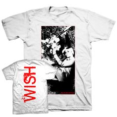 Back in stock, the classic "Wish" design from Blacklisted. Blacklist Shirt, Back In Stock, Holiday Shirts, White T Shirt, Classic Shirt, Sports Shirts, White Tshirt, White T, Colorful Prints