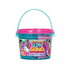 a blue and pink plastic bucket filled with slimmy sand