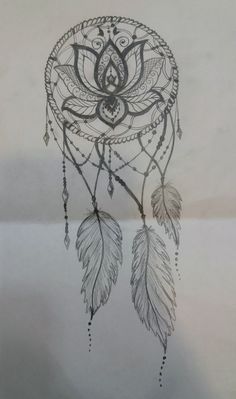 a drawing of a dream catcher with feathers hanging from it's sides and an intricate design on the side