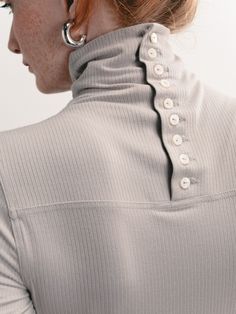 A turtleneck is a staple piece for a classic look, worn by itself or under any sweater or jacket. This one has interesting details such as a fine ribbed fabric and buttons up the back of the neck—yes, wear your hair up to show them! And remember, the little details of your life matter. Designer Turtleneck, Architectural Fashion, Outfit Ideas Winter, Winter Outfits Aesthetic, Winter Dress Outfits, Turtleneck Shirt, Winter Outfit Inspiration, Winter Dress, Room Size