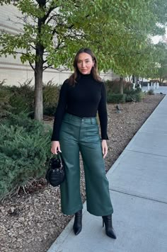 Elevate your wardrobe with our green faux leather wide leg pants. These luxe pants feature a cropped length and wide leg design, perfect for any occasion. Made with high-quality faux leather, they provide a fashion-forward look without compromising on comfort. The perfect combination of style and functionality. high waisted butter soft faux leather front pockets and back pockets true to size 100% polyester wash cold on gentle cycle inside out model is wearing a medium Dark Green Leather Pants Outfit, Olive Leather Pants Outfit, Forest Green Pants Outfit, Leather Wide Leg Pants Outfit, Green Leather Pants Outfit, Green Wide Leg Pants Outfit, Leather Pants Wide Leg, Green Faux Leather Pants, Cropped Leather Pants