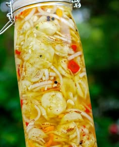 a jar filled with food sitting on top of a table