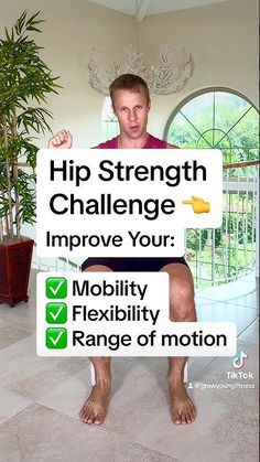 a man sitting on top of a chair holding a sign that reads hip strength challenge improve your mobility flexibility range of motion