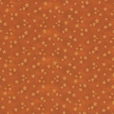 an orange background with gold stars on it