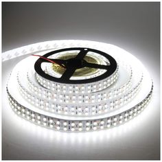 white led strip light with red and blue lights on the side, in front of a white background