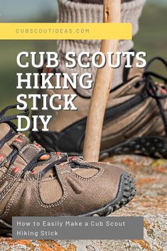 a pair of hiking shoes with the words cub scouts hiking stick diy on it