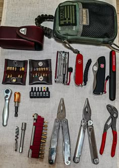 many different tools are laid out on the table