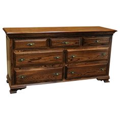 a large wooden dresser with drawers and knobs