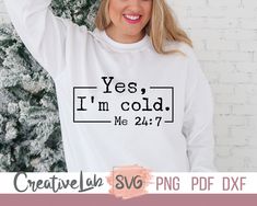 a woman wearing a sweatshirt that says yes, i'm cold me 2 / 4 / 7